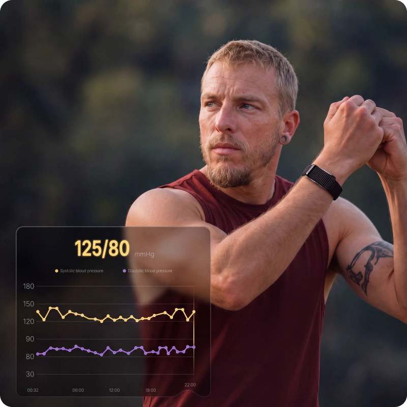 A man stretching outdoors wearing the HLTH Band, with his blood-pressure trend on screen